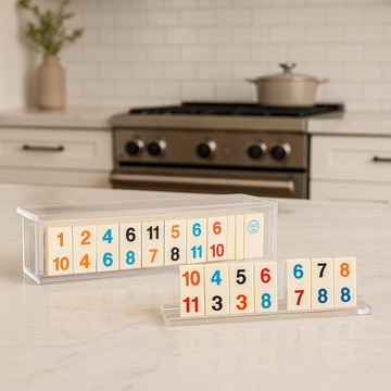 Luxury acrylic board games by Aliz Collection styled on a modern coffee table